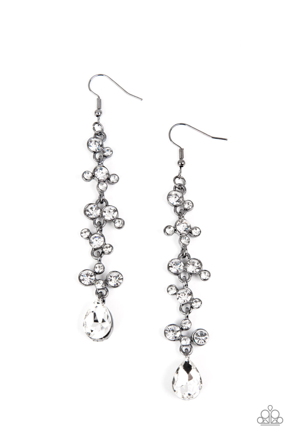 Encased in glistening gunmetal fittings, dainty clusters of sparkly white rhinestones delicately link into an elegantly elongated lure. An oversized teardrop rhinestone drips from the bottom, adding a dash of drama to the glamorously dazzling display. Earring attaches to a standard fishhook fitting. Sold as one pair of earrings.