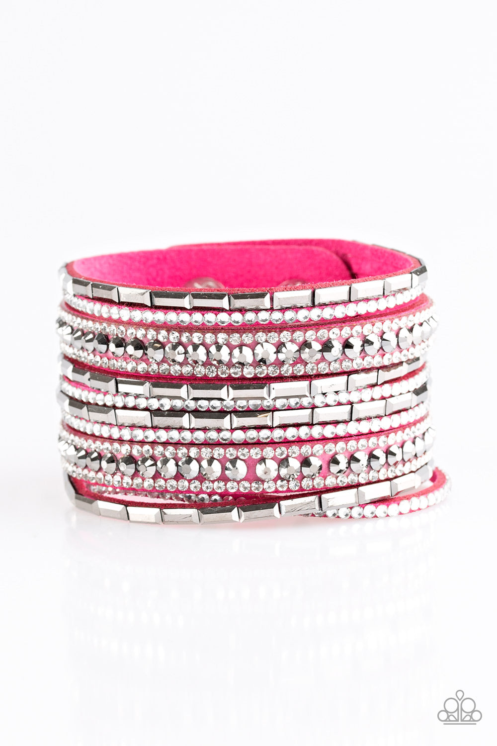 Varying in size and shape, glassy white and smoky hematite rhinestones are encrusted along strands of vivacious pink suede for a sassy look. Features an adjustable snap closure. Sold as one individual bracelet.
