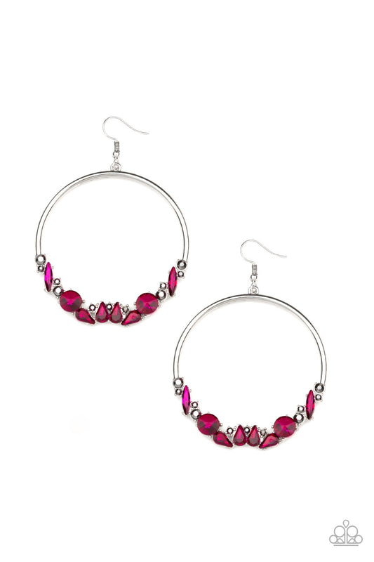 Vary in size and shape, an edgy collection of pink and hematite rhinestones are encrusted along the bottom of a silver hoop for a glamorous look. Earring attaches to a standard fishhook fitting.  Sold as one pair of earrings.