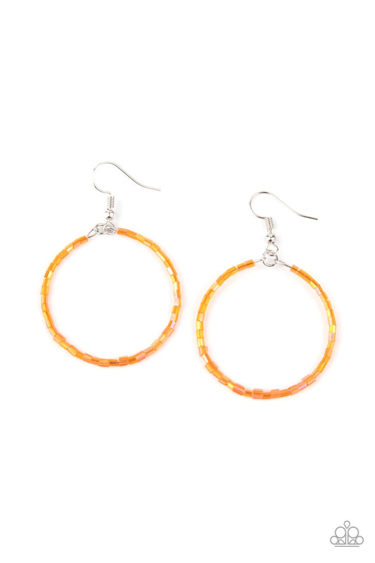 Featuring an iridescent shimmer, glassy orange seed beads are threaded along a dainty wire hoop for a colorful finish. Earring attaches to a standard fishhook fitting.  Sold as one pair of earrings.