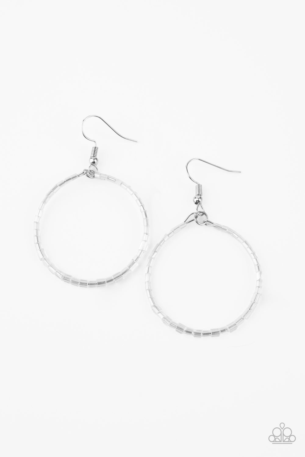 Featuring an iridescent shimmer, glassy white seed beads are threaded along a dainty wire hoop for a colorful finish. Earring attaches to a standard fishhook fitting.  Sold as one pair of earrings.