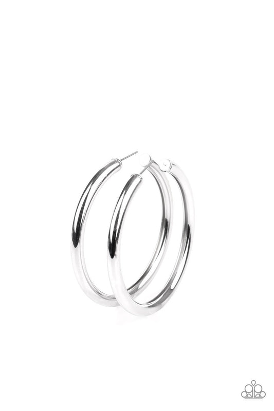 A thick silver bar delicately curls into a glistening oversized hoop for a retro look. Earring attaches to a standard post fitting. Hoop measures approximately 2 1/4" in diameter.  Sold as one pair of hoop earrings.