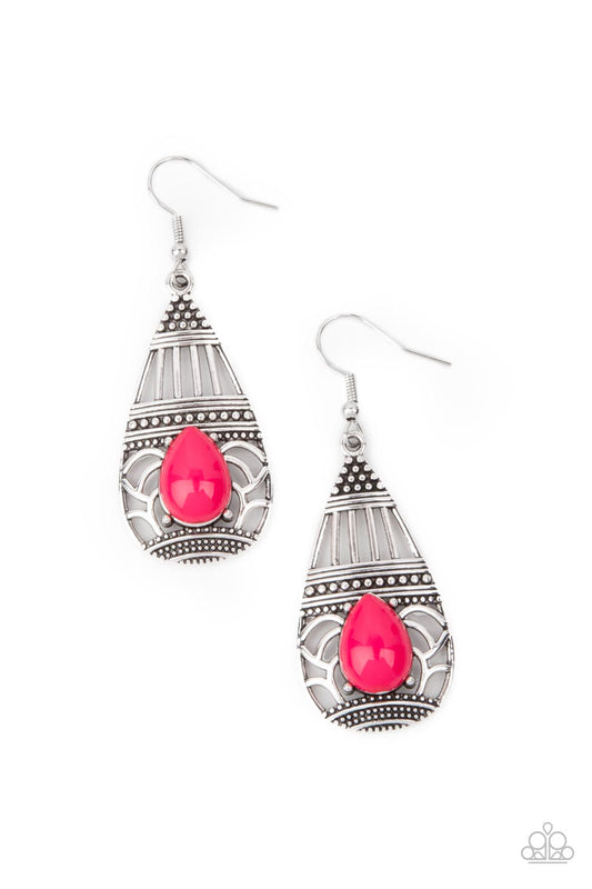 The studded front of an ornately stenciled silver teardrop is embellished with a vivacious pink teardrop bead, creating a whimsically colorful frame. Earring attaches to a standard fishhook fitting.  Sold as one pair of earrings.