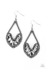 Bordered in sections of dainty hematite rhinestones and antiqued silver studs, the bottom of an elongated silver teardrop is embellished in edgy marquise style hematite rhinestones for an epic finish. Earring attaches to a standard fishhook fitting.  Sold as one pair of earrings.
