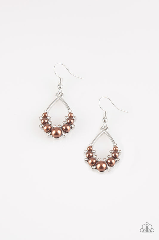 Dainty white rhinestones and pearly brown beads collect at the bottom of a silver teardrop frame for a glamorous look. Earring attaches to a standard fishhook fitting.  Sold as one pair of earrings.