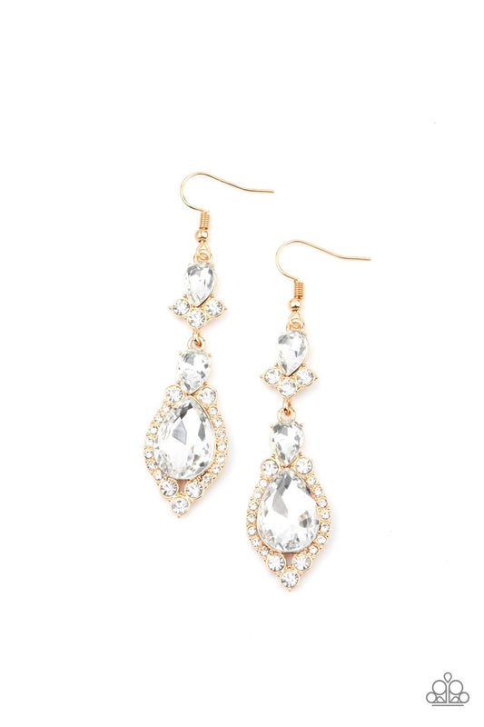 Encased in sleek gold frames, a sparkly series of round and teardrop white rhinestones flawlessly stack into a timelessly twinkly lure for a jaw-dropping look. Earring attaches to a standard fishhook fitting.  Sold as one pair of earrings.