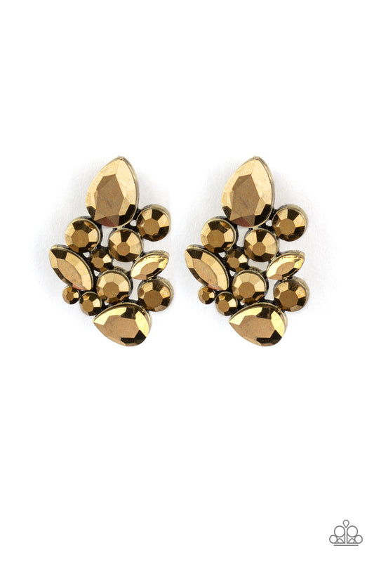 Featuring an array of round, teardrop, and marquise style cuts, a collision of aurum rhinestones explode into a blinding frame. Earring attaches to a standard post fitting.  Sold as one pair of post earrings.