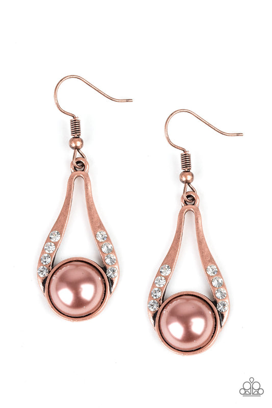 A pearly copper bead is nestled along the bottom of an elegant copper frame radiating with glassy rhinestones for a timeless look. Earring attaches to a standard fishhook fitting.  Sold as one pair of earrings.