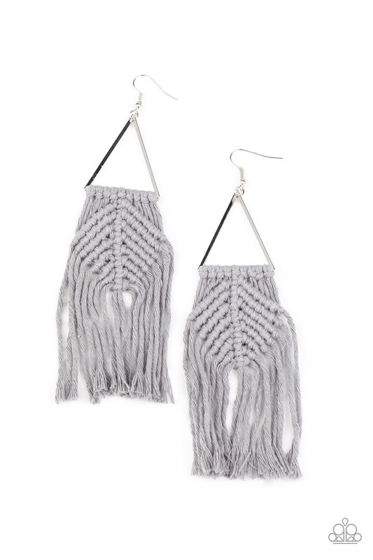 Sleet cording delicately knots and weaves around the bottom of an airy silver triangle, creating a colorful macramé inspired fringe. Earring attaches to a standard fishhook fitting.  Sold as one pair of earrings.