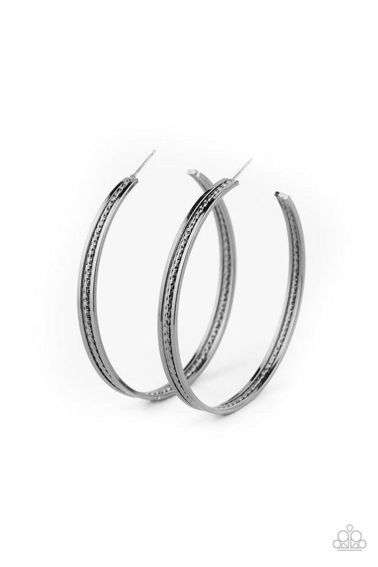 Featuring diamond-cut shimmer, a textured gunmetal bar is bordered by two glistening gunmetal bars, coalescing into an edgy hoop. Earring attaches to a standard post fitting. Hoop measures approximately 2 3/4" in diameter.  Sold as one pair of hoop earrings.