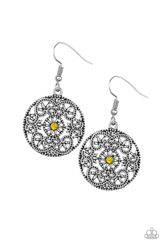Regal silver filigree climbs a silver hoop, creating a frilly frame. A dainty yellow rhinestone dots the center for a whimsical finish. Earring attaches to a standard fishhook fitting.  Sold as one pair of earrings.