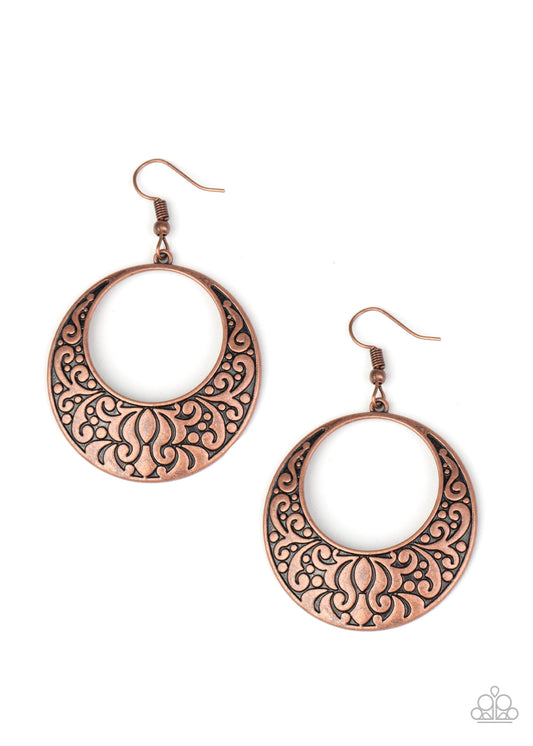 Vine-like filigree is embossed along the bottom of an antiqued copper hoop for a seasonal flair. Earring attaches to a standard fishhook fitting.  Sold as one pair of earrings.