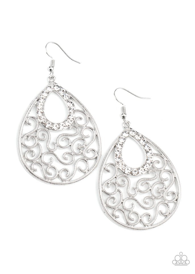 A glittery white rhinestone teardrop frame nestles at the top of an antiqued silver teardrop filled with whimsical vine-like filigree. Earring attaches to a standard fishhook fitting.  Sold as one pair of earrings.