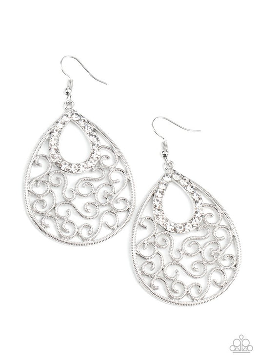 A glittery white rhinestone teardrop frame nestles at the top of an antiqued silver teardrop filled with whimsical vine-like filigree. Earring attaches to a standard fishhook fitting.  Sold as one pair of earrings.