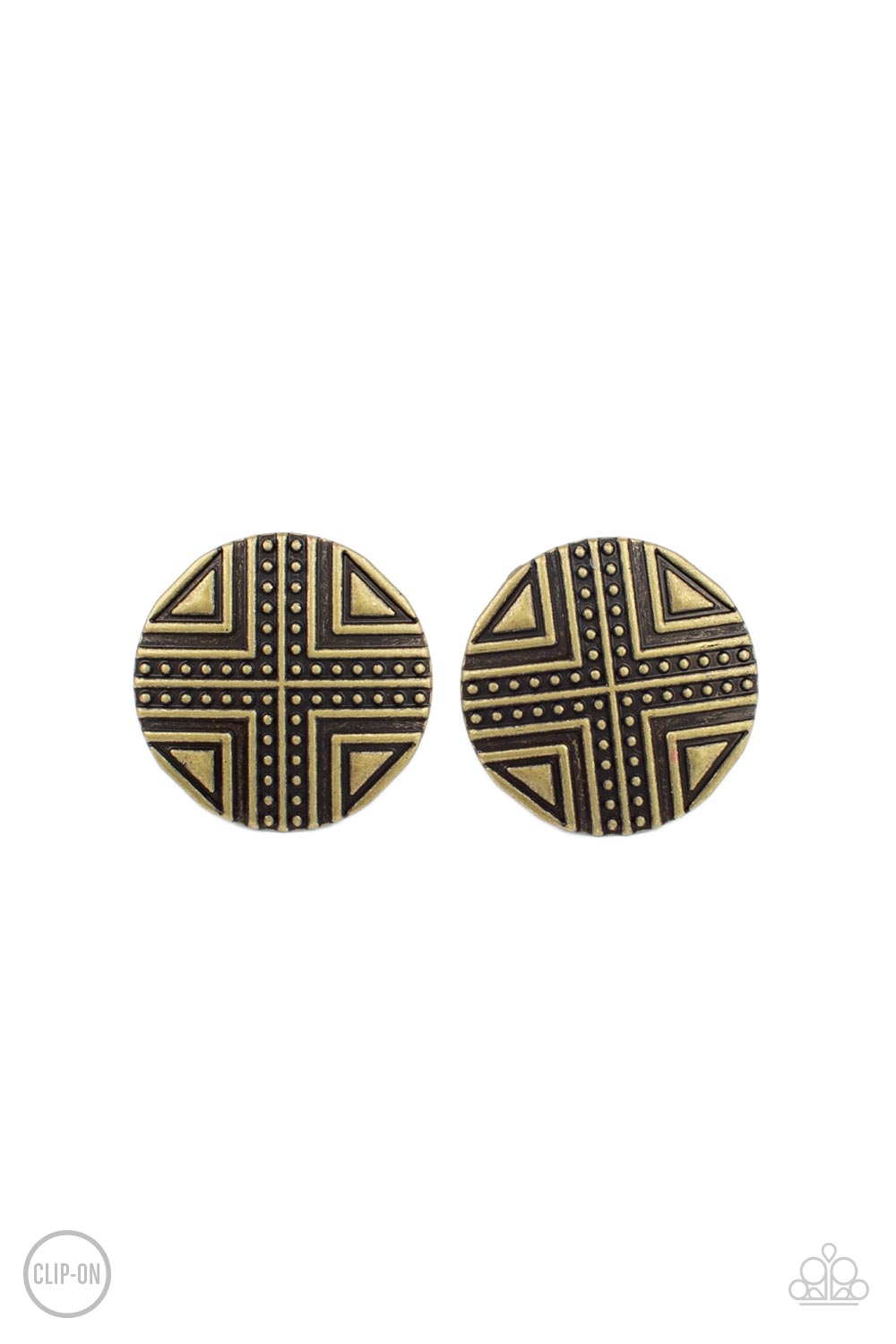 Brushed in an antiqued shimmer, a round brass frame is studded and embossed in crisscrossed geometric patterns for an indigenous look. Earring attaches to a standard clip-on fitting.  Sold as one pair of clip-on earrings.
