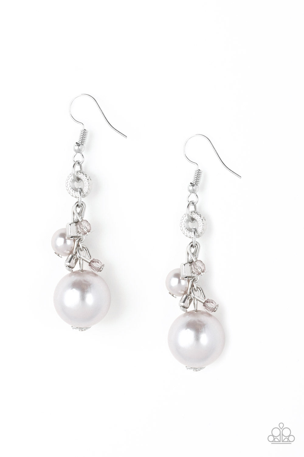 A bubbly white pearl, glassy crystal-like beads, and shimmery silver cube beads trickle along a glistening silver chain. An oversized white pearl swings from the bottom of the chain, creating a dramatic lure. Earring attaches to a standard fishhook fitting.  Sold as one pair of earrings.