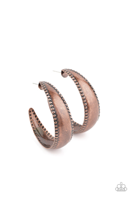 Bordered in a flattened studded pattern, an antiqued copper hoop curls into a dainty hoop for a rustic flair. Earring attaches to a standard post fitting. Hoop measures approximately 1 1/2" in diameter.  Sold as one pair of hoop earrings.