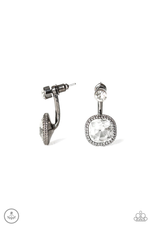A solitaire white rhinestone attaches to a double-sided post, designed to fasten behind the ear. Featuring a faceted white gem, the glitzy double-sided post peeks out beneath the ear for a refined look. Earring attaches to a standard post fitting.  Sold as one pair of double-sided post earrings.