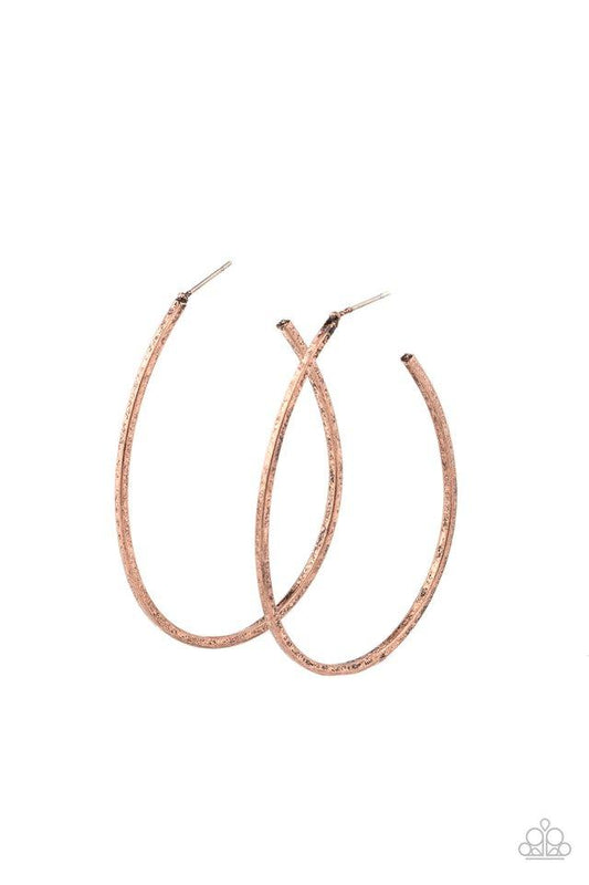 An antiqued copper bar unexpectedly curls into an edgy shaped hoop for an abstract look. Earring attaches to a standard post fitting. Hoop measures approximately 1 3/4" in diameter.  Sold as one pair of hoop earrings.