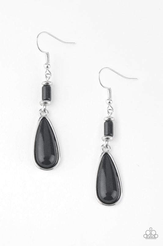 Chiseled into a tranquil teardrop, an earthy black stone bead swings from the bottom stack of silver and stone beads, creating a seasonal lure. Earring attaches to a standard fishhook fitting.  Sold as one pair of earrings.