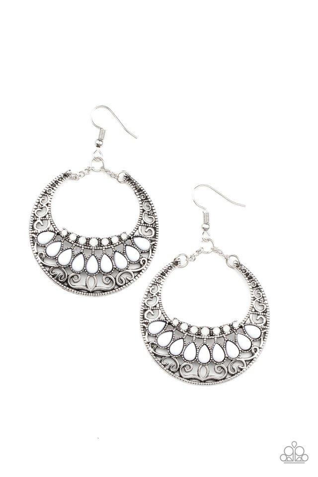 Faceted in light-reflecting textures, a beveled silver hoop swings from the ear for an edgy shine. Earring attaches to a standard fishhook fitting.  Sold as one pair of earrings.