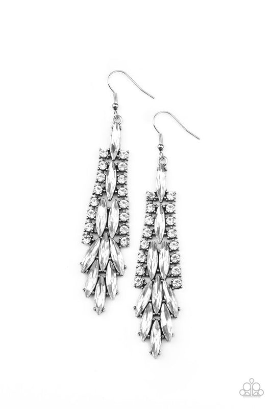 Glassy white marquise cut rhinestones cascade from the center of a silver frame bordered in ribbons of dainty white rhinestones, creating a glamorous chandelier. Earring attaches to a standard fishhook fitting.  Sold as one pair of earrings.