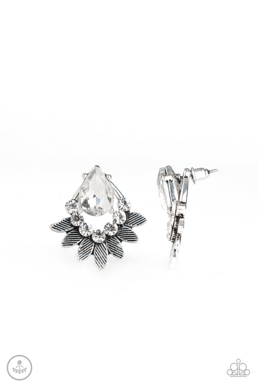 A solitaire white teardrop gem attaches to a double-sided post designed to fasten behind the ear. Dotted in dainty white rhinestones, a leafy silver double-sided frame peeks out beneath the ear for an eye-catching look. Earring attaches to a standard post fitting.  Sold as one pair of double-sided post earrings.