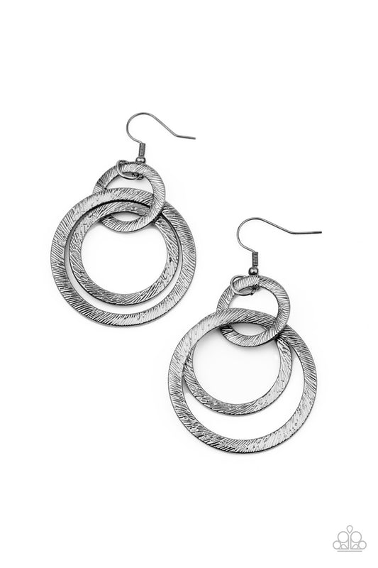 Etched and embossed in shimmery textures, a trio of glistening gunmetal hoops interlock into a dizzying lure. Earring attaches to a standard fishhook fitting.  Sold as one pair of earrings.