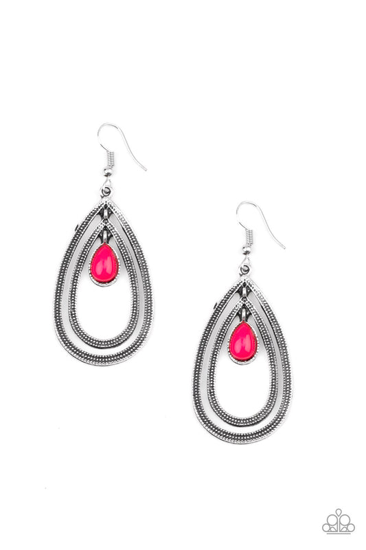 A pink teardrop bead is nestled inside two silver teardrops radiating in studded textures, creating a dizzying lure. Earring attaches to a standard fishhook fitting.

Sold as one pair of earrings.