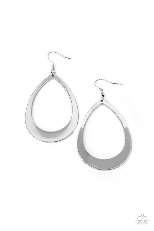 Widening at the bottom, a flat glistening silver teardrop swings from the ear for a simplistic shimmer. Earring attaches to a standard fishhook fitting.

Sold as one pair of earrings.