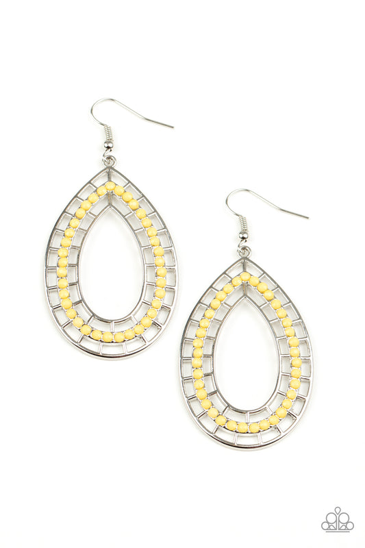 Dainty yellow beads dot the front of a stenciled silver teardrop, creating a colorful lure. Earring attaches to a standard fishhook fitting.

Sold as one pair of earrings.