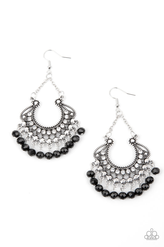 White rhinestone dotted petals fan out into a studded scalloped frame. Glittery black crystal-like beads swing from the bottom of the decorative silver frame, creating a glamorous fringe. Earring attaches to a standard fishhook fitting.  Sold as one pair of earrings.