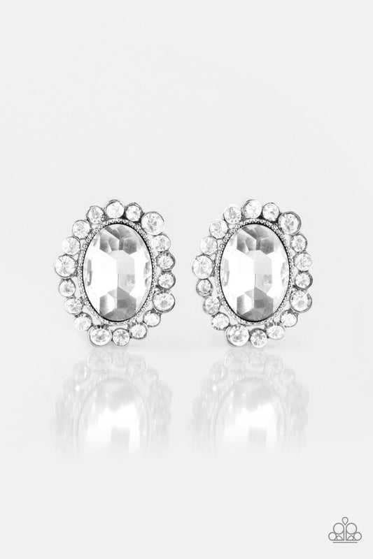 Varying in size, dainty white rhinestones spin around a faceted white gem for a timeless look. Earring attaches to a standard clip-on fitting.  Sold as one pair of clip-on earrings.