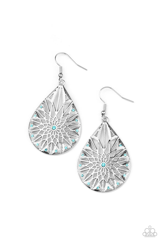 Featuring a shattered snowflake pattern, the front of an airy silver teardrop is adorned in dainty blue rhinestones for an icy finish. Earring attaches to a standard fishhook fitting.  Sold as one pair of earrings.
