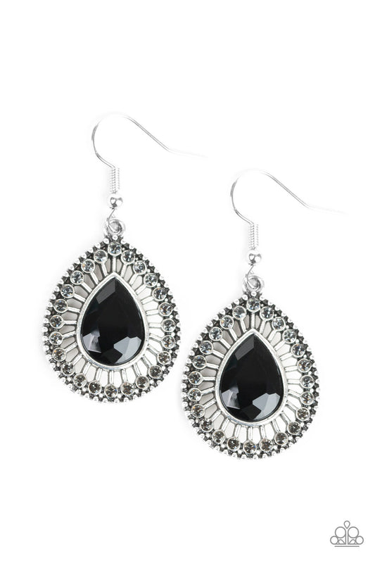 A teardrop black rhinestone is pressed into an ornate silver teardrop frame radiating with dainty smoky rhinestones for a refined flair. Earring attaches to a standard fishhook fitting.  Sold as one pair of earrings.