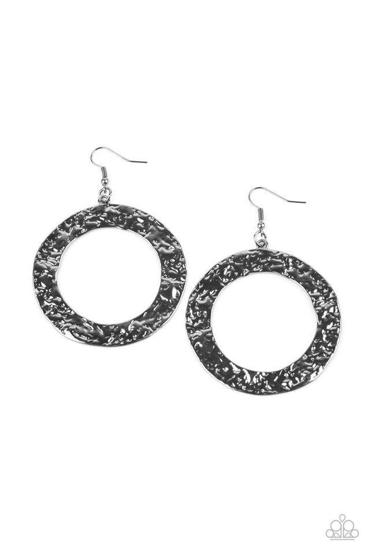 A flat gunmetal circular frame has been hammered in blinding detail for a handcrafted look. Earring attaches to a standard fishhook fitting.

Sold as one pair of earrings.
