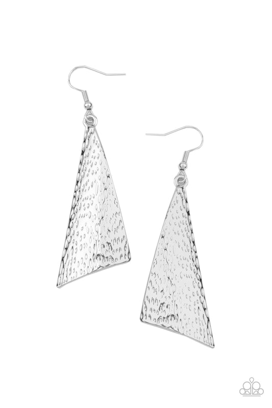 Delicately hammered in blinding shimmer, an asymmetrical silver frame delicately curls into an edgy statement piece. Earring attaches to a standard fishhook fitting.  Sold as one pair of earrings.