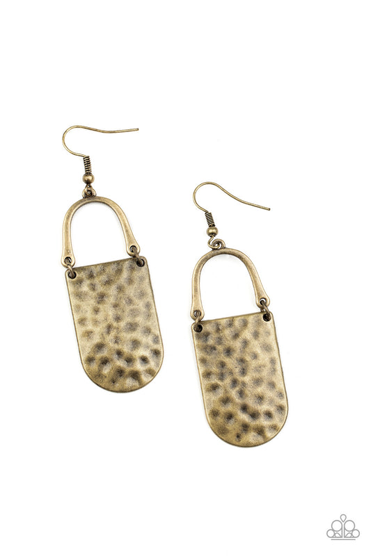 A hammered brass piece links to the bottom of a bowing brass bar, creating an abstract lure. Earring attaches to a standard fishhook fitting.  Sold as one pair of earrings.