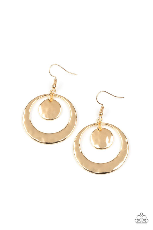 A hammered gold disc swings from the top of a hammered gold hoop that widens at the bottom, creating a radiant lure. Earring attaches to a standard fishhook fitting.  Sold as one pair of earrings.