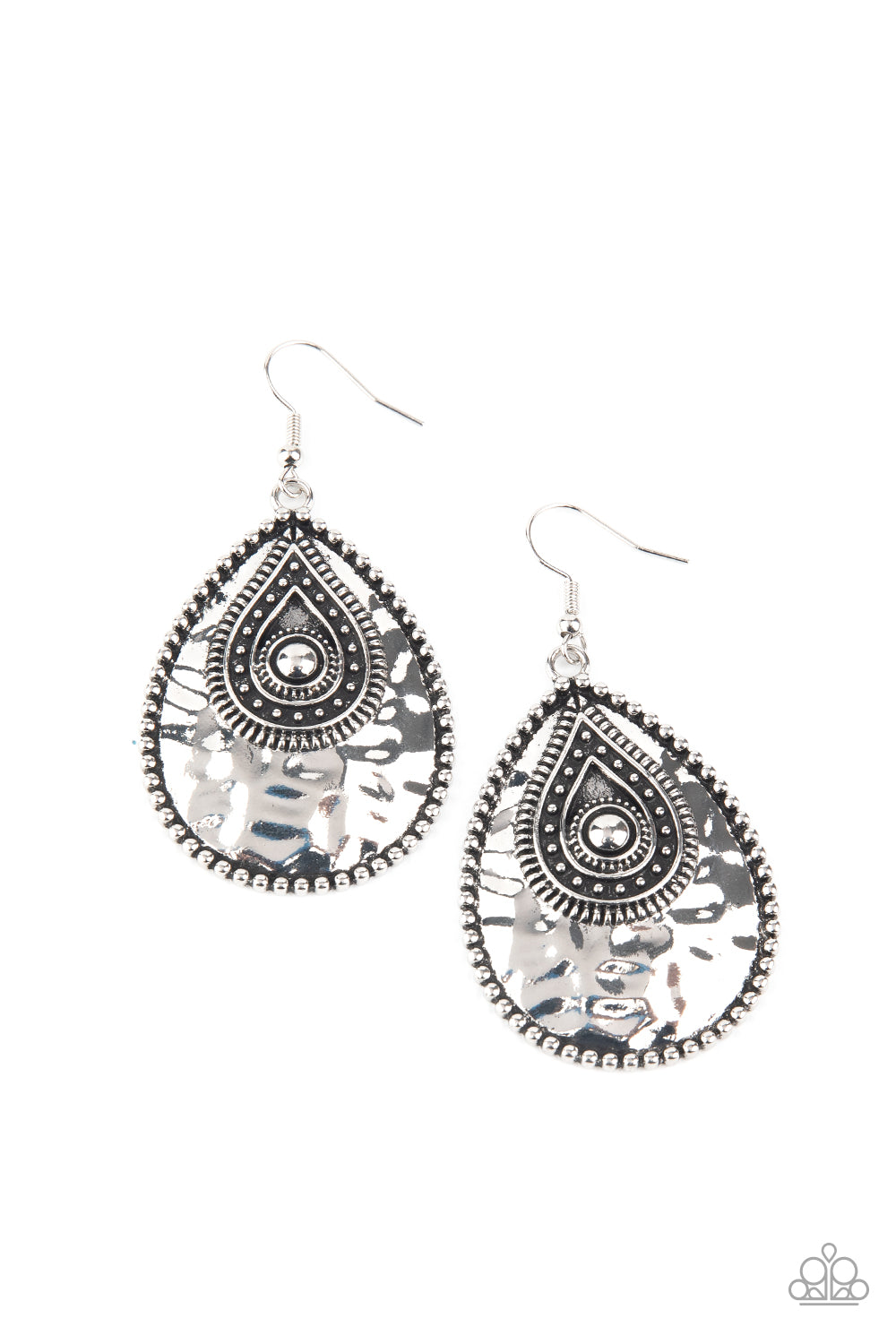 Bordered in antiqued studs, a hammered silver teardrop is embellished with matching rustic details for a handcrafted finish. Earring attaches to a standard fishhook fitting.  Sold as one pair of earrings.