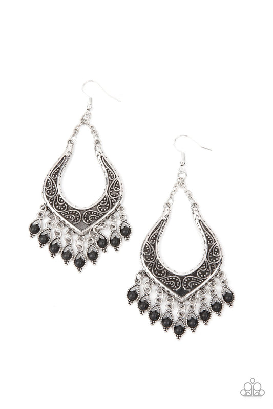 Dotted with dainty black stones, decorative silver frames swing from the bottom of an ornately studded silver frame, creating a simply seasonal fringe. Earring attaches to a standard fishhook fitting.  Sold as one pair of earrings.