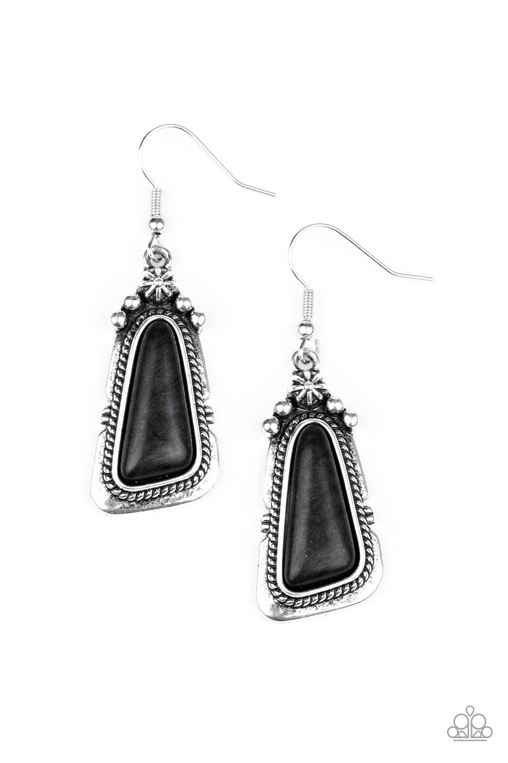 An imperfect black stone is pressed into the center of a studded silver frame featuring silver rope-like texture. Earring attaches to a standard fishhook fitting.  Sold as one pair of earrings.