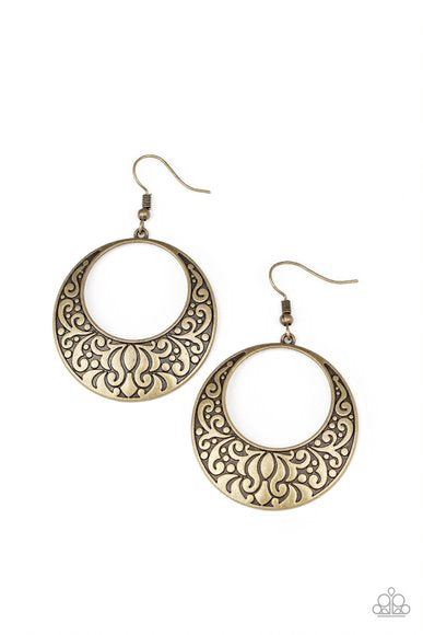 Vine-like filigree is embossed along the bottom of an antiqued brass hoop for a seasonal flair. Earring attaches to a standard fishhook fitting.  Sold as one pair of earrings.
