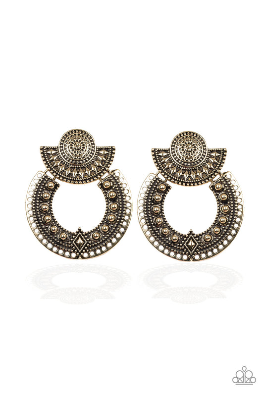 Studded and embossed in ornate textures and patterns, round and half moon brass frames stack into a tribal inspired lure for a trendy look. Earring attaches to a standard post fitting.  Sold as one pair of post earrings.