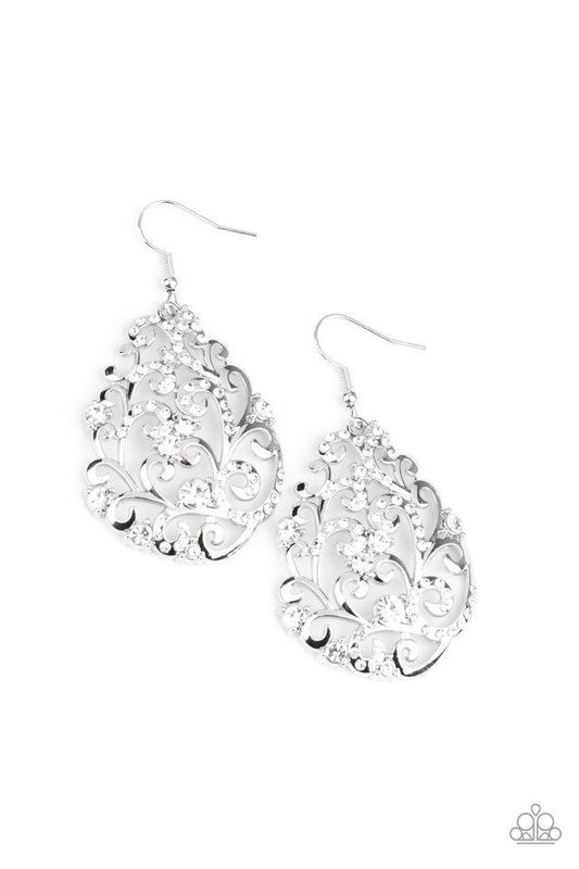 Dotted in an array of glittery white rhinestones, shiny silver filigree climbs the ear, coalescing into a vine-like teardrop frame. Earring attaches to a standard fishhook fitting.  Sold as one pair of earrings.