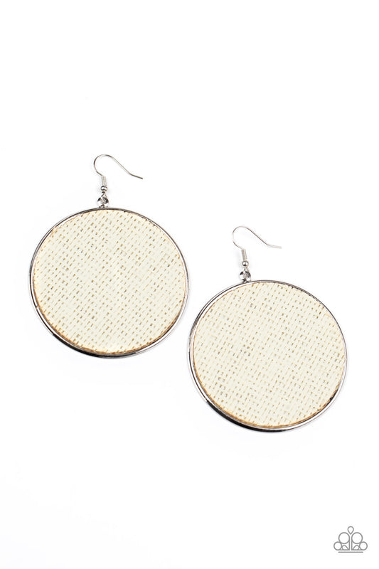 White twine-like cording weaves across the front of an oversized silver disc for an earthy flair. Earring attaches to a standard fishhook fitting.  Sold as one pair of earrings.