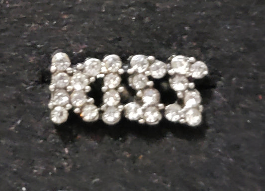 Kid's silver earrings with the work KISS with white rhinestones