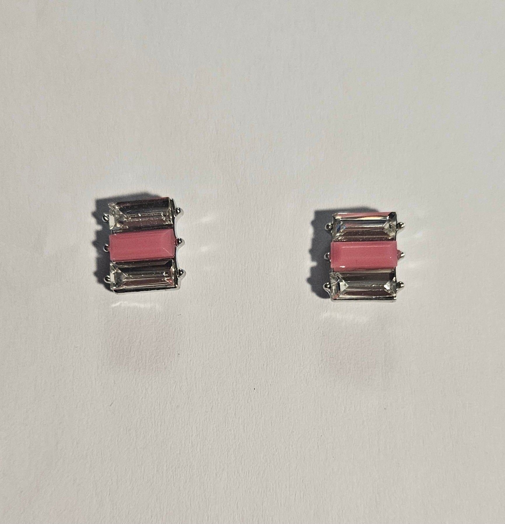 Kids' rectangle earrings with pink rectangle bead in center and clear rectangle beads on each side