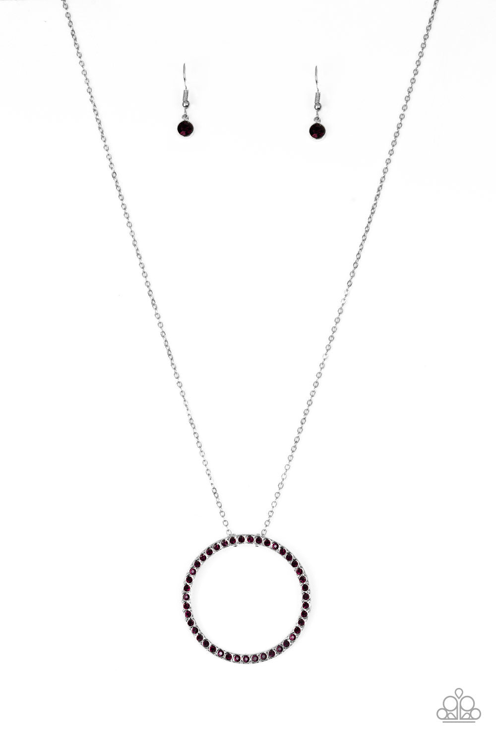 Encrusted in glittery purple rhinestones, a dramatic silver hoop swings from the bottom of a lengthened silver chain for a refined look. Features an adjustable clasp closure.  Sold as one individual necklace. Includes one pair of matching earrings.