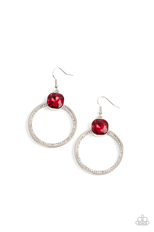 n oversized red gem sits atop a silver hoop with an inner ring encrusted in glitzy white rhinestones, resulting in a timeless twinkle. Earring attaches to a standard fishhook fitting.  Sold as one pair of earrings.